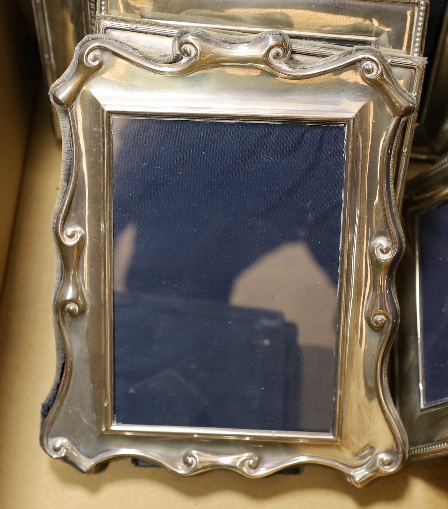 Nine assorted modern silver mounted photograph frames, including one pair, largest 32cm.